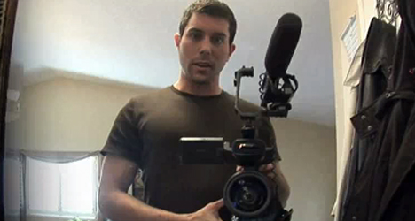 Micah (Micah Sloat) hopes to capture some of the eerie things happening in his house during the night on camera in "Paranormal Activity."