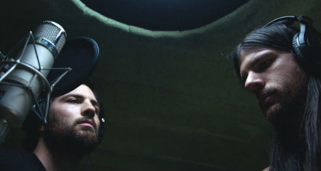Scott Avett (left) and Seth Avett (right) prepare to record a song in "May It Last: A Portrait of the Avett Brothers."